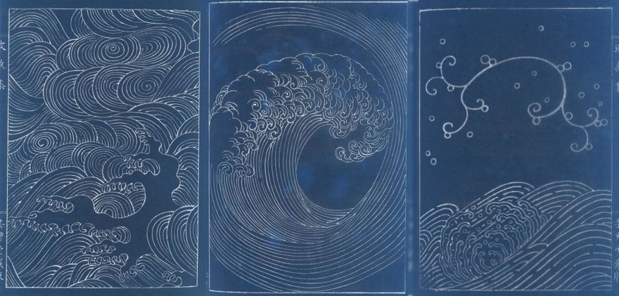 Triptych of wave engravings, made denim blue